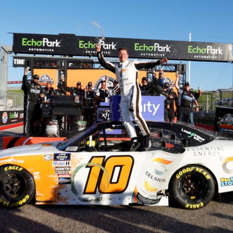 A.J. Allmendinger celebrates in Victory Lane after winning the Pit Boss 250 presented by USA TODAY at Circuit of The Americas on Saturday, March 25, 2023 in Austin, Texas.