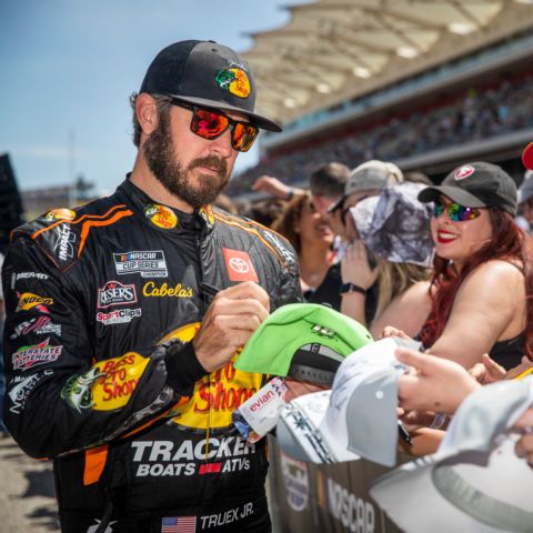 NASCAR Cup Series driver Martin Truex Jr. signs autographs for race fans at the 2022 NASCAR weekend at Circuit of The Americas in Austin, Texas. Truex, along with other drivers, will be making fan appearances throughout this weekend’s NASCAR at COTA event.