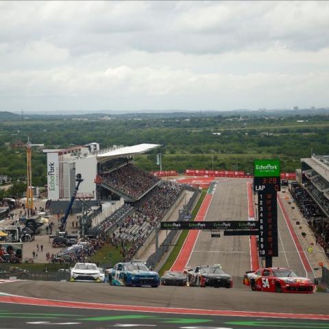 Kyle Busch scored the Pit Boss 250 NASCAR Xfinity Series victory Saturday at the challenging Circuit of The Americas road course near Austin, Texas. In this photo, Busch powers his No. 54 Toyota Supra up the hill into the famed Turn 1 on the demanding 3.41-mile, 20-turn layout.